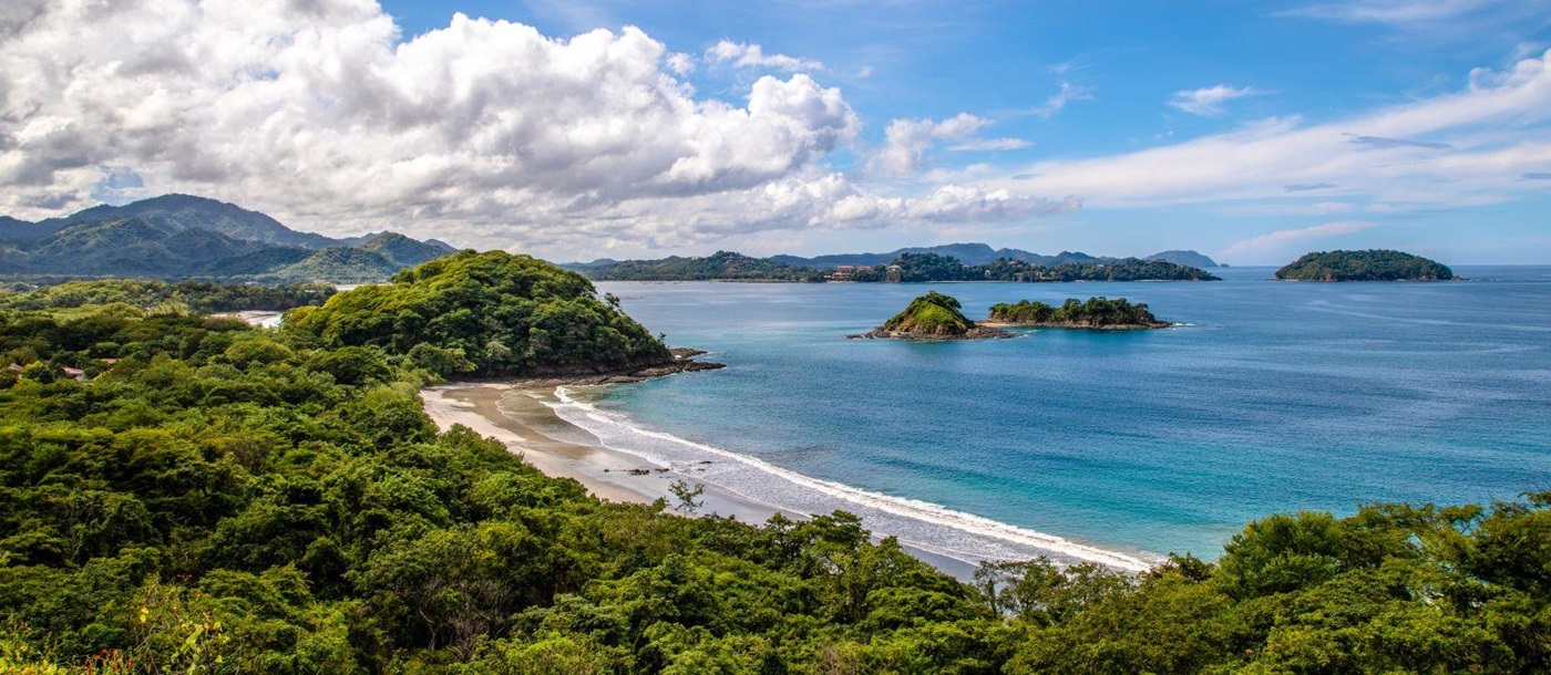 View of a bay surrounded by forest on the Nicoya Peninsula in Costa Rica