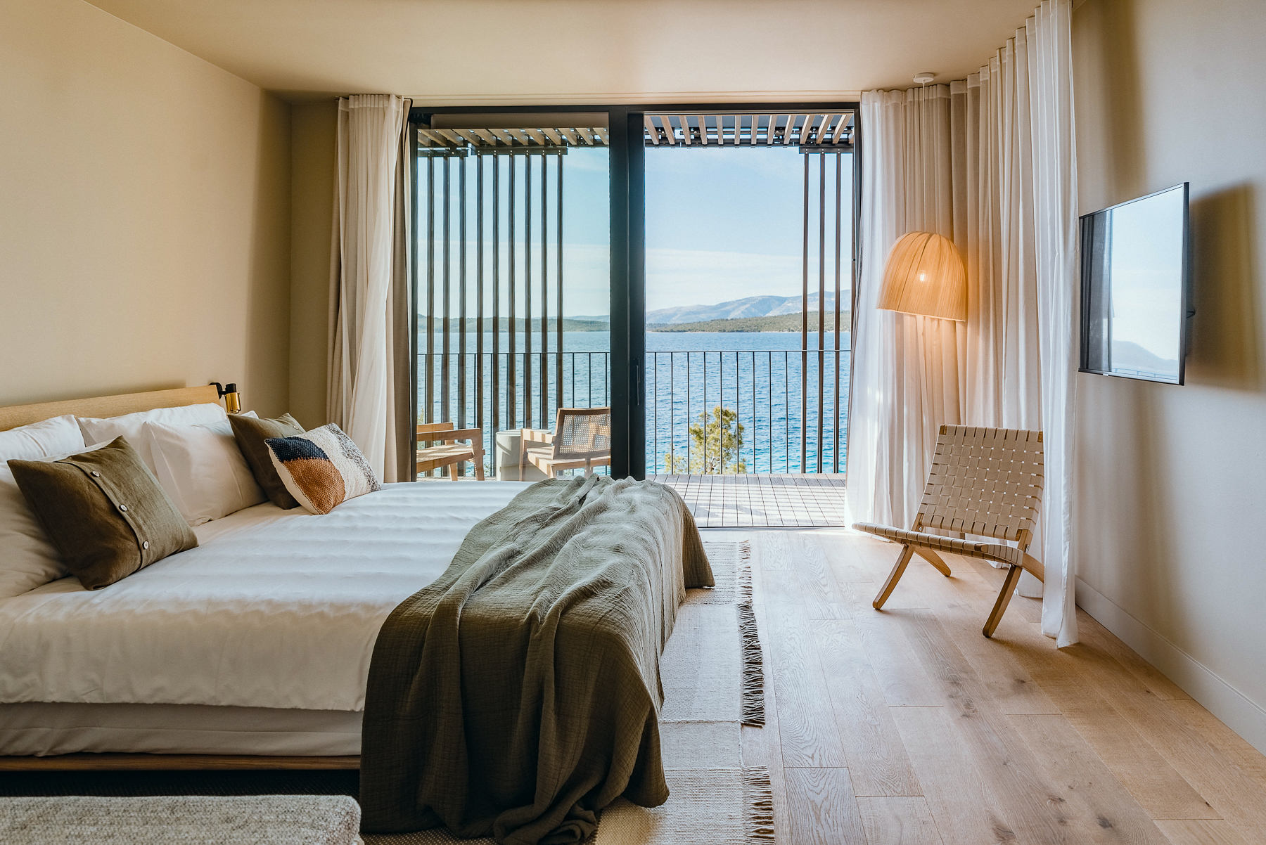 Villa bedroom with ocean views at the Maslina Resort in Croatia