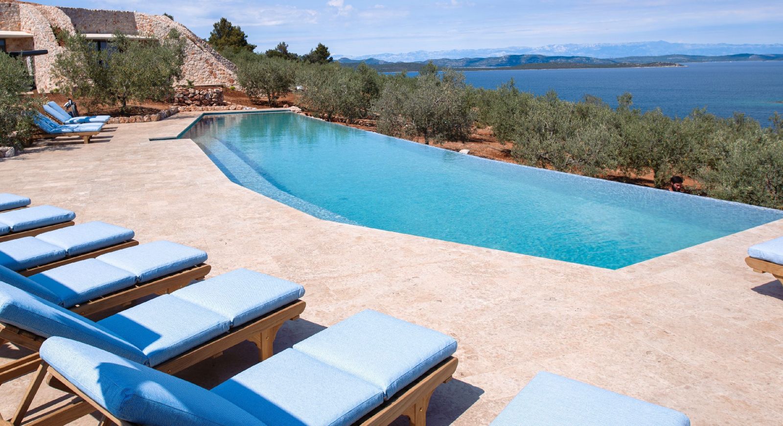 Pool and sun terrace at Villa Nai 3.3 in Croatia