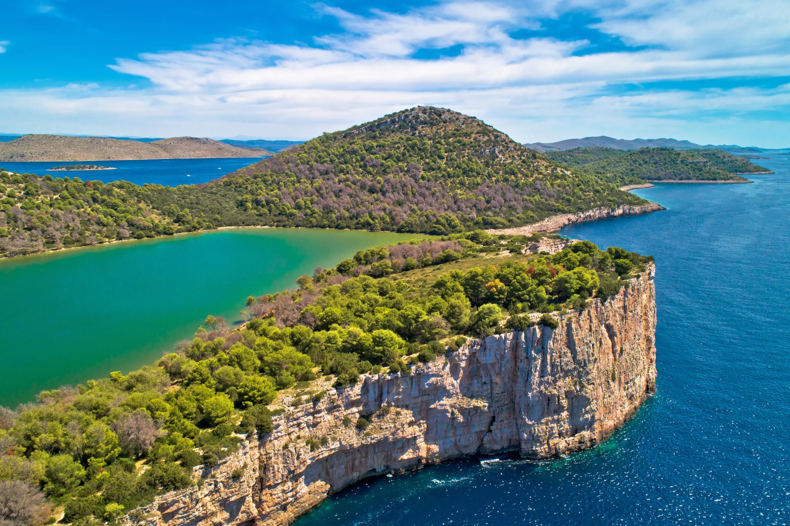 Elevated green lake surrounded by forest on Kornati Island in Croatia