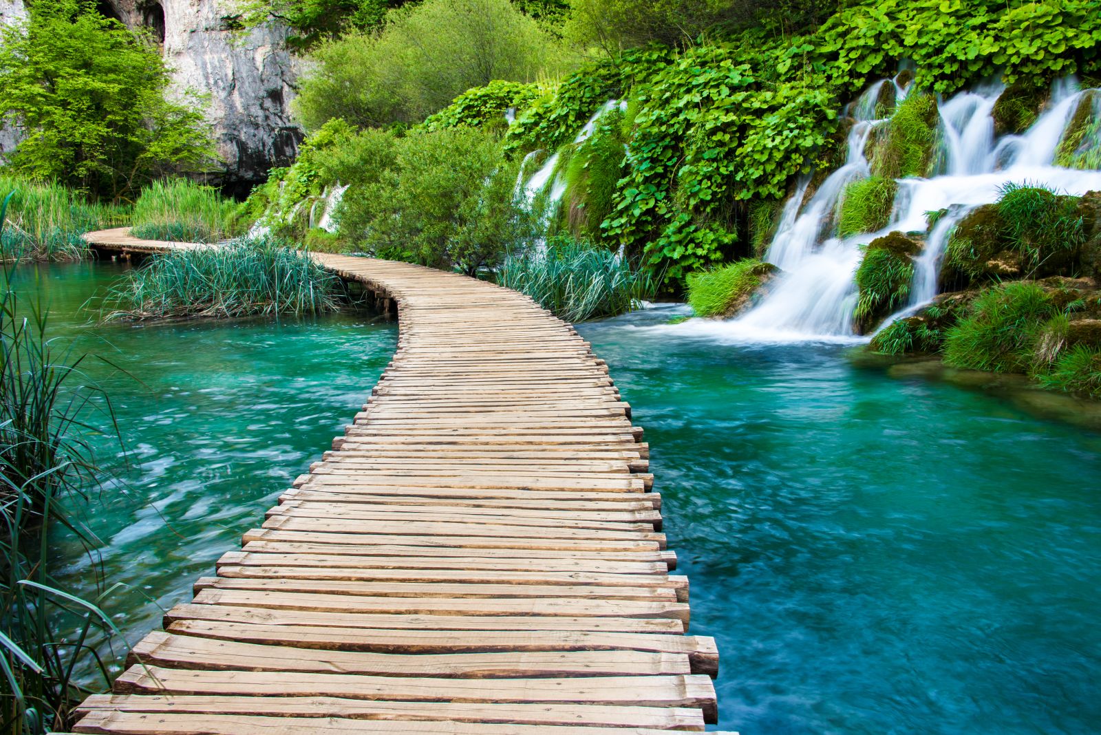 A walkway leading past waterfalls in Krka National Park Croatia