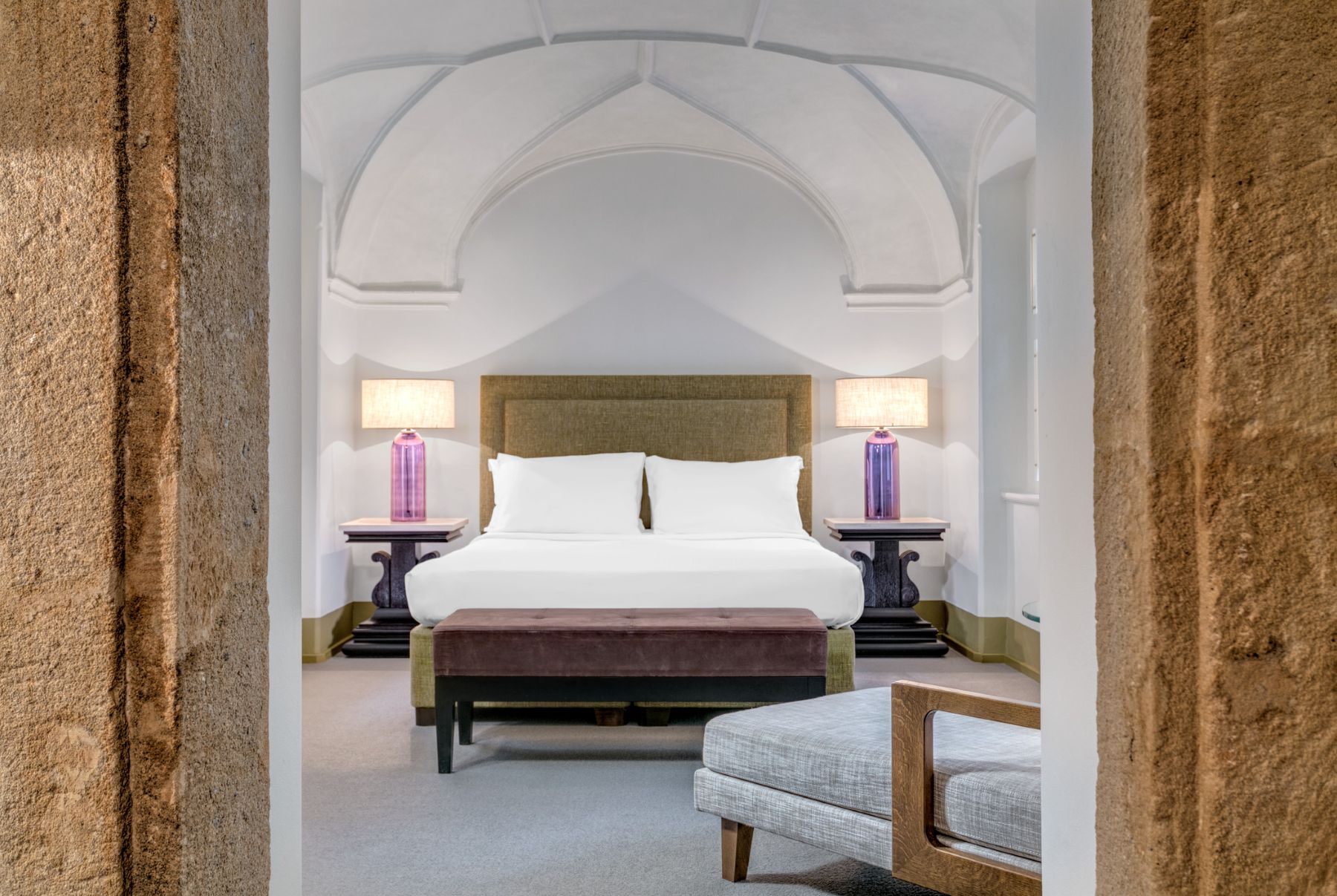 Classic suite bedroom at The Augustine in Prague