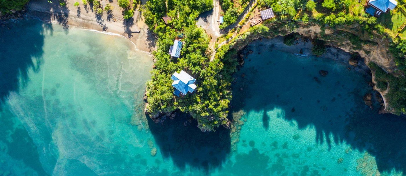 Aerial view of Secret Bay in Dominica and turquoise seas
