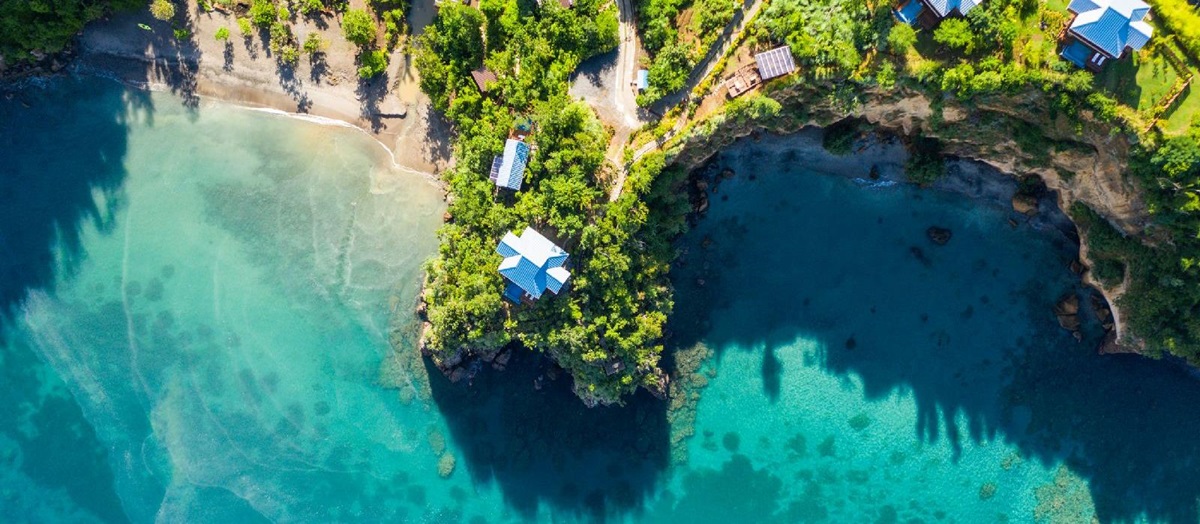 Aerial view of Secret Bay in Dominica and turquoise seas