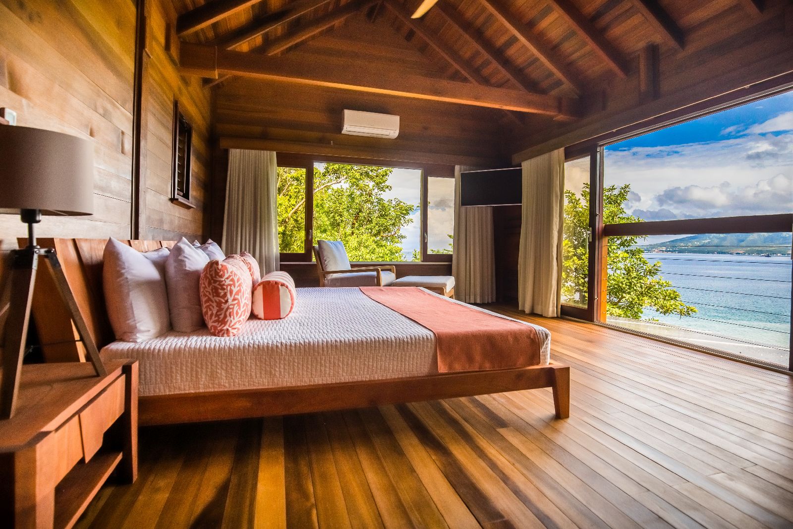 Sea views from the bedroom of the Ti Fey villa at Secret Bay in Dominica