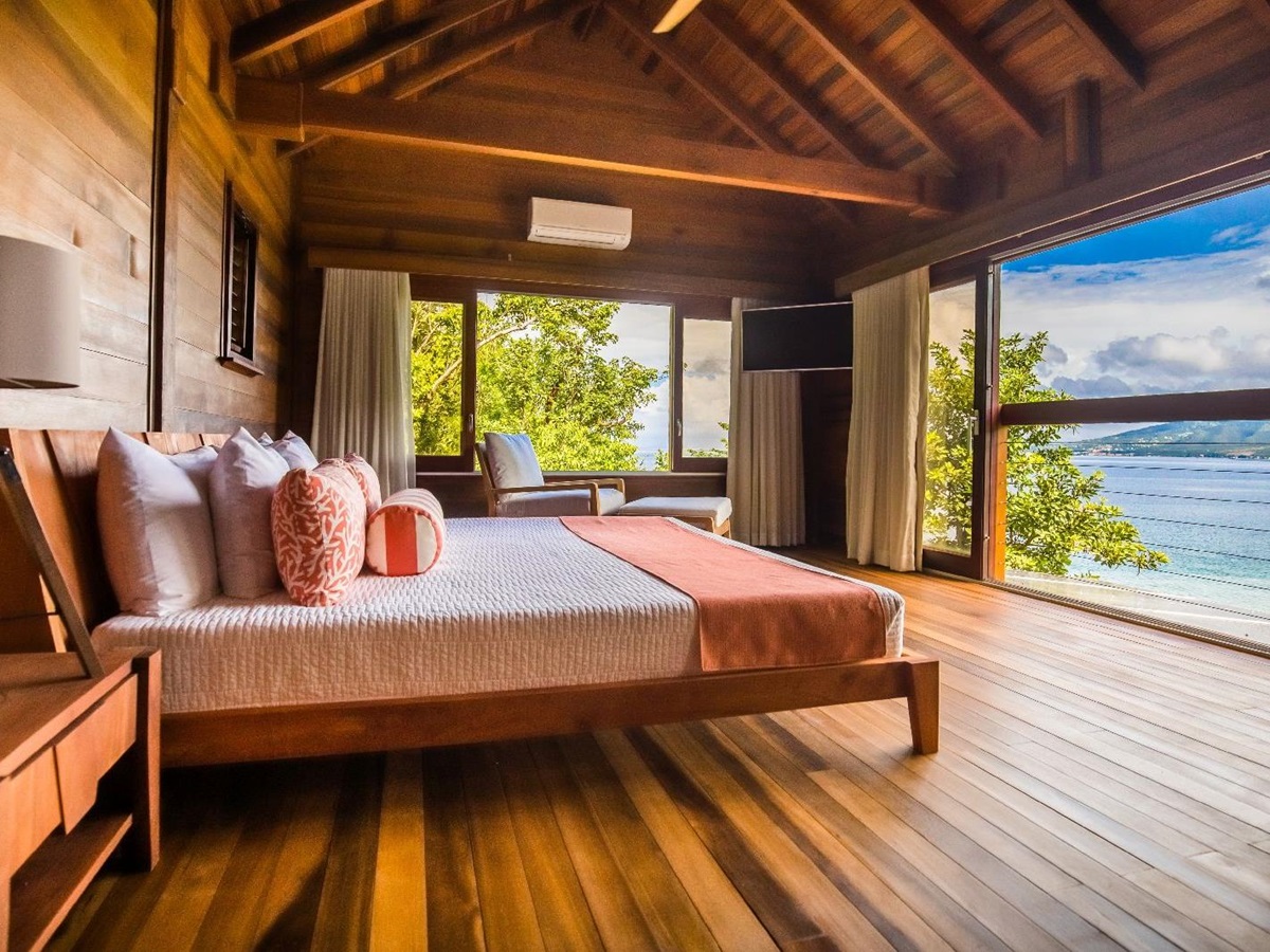 Sea views from the bedroom of the Ti Fey villa at Secret Bay in Dominica
