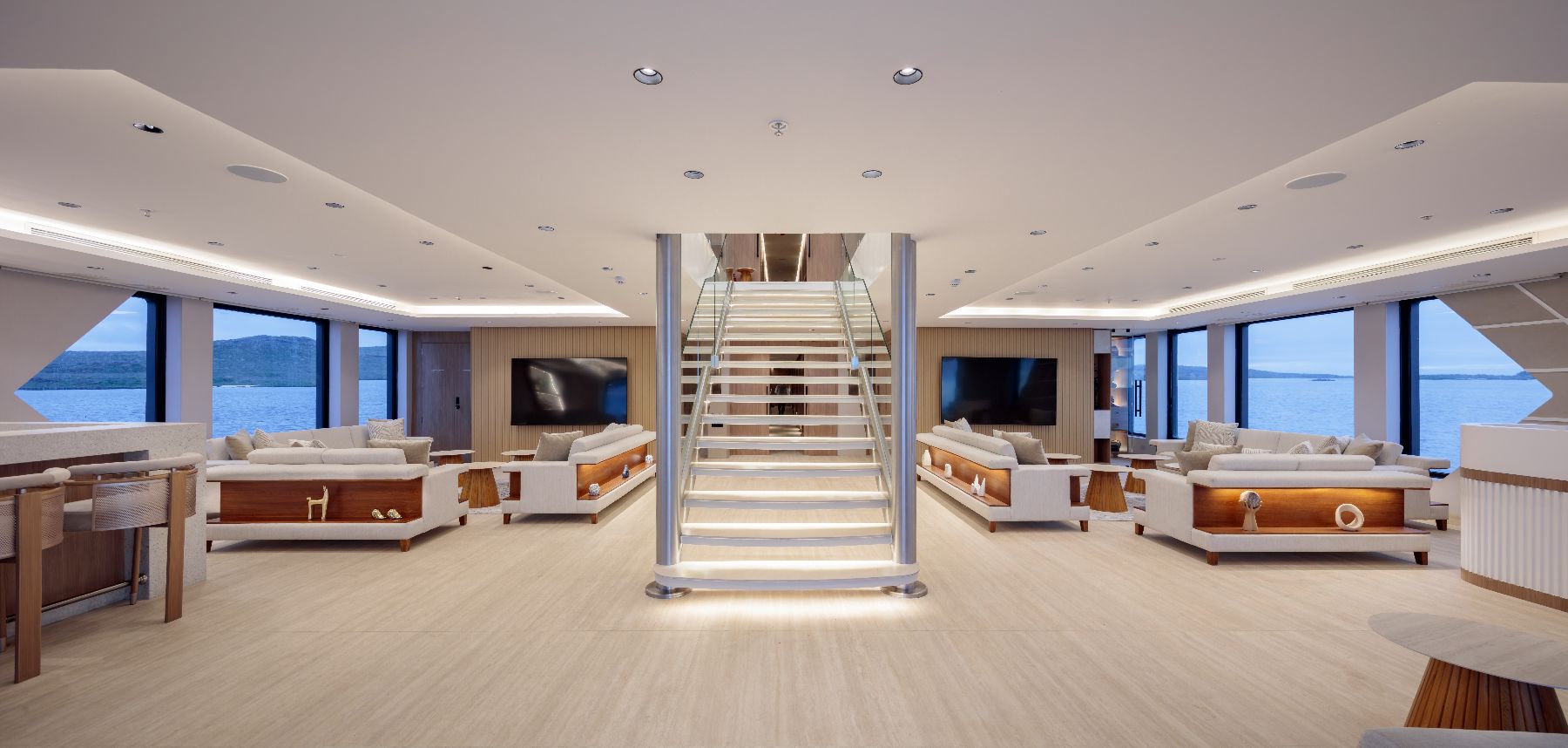 Spacious indoor lounge on board the Hermes Galapagos luxury catamaran