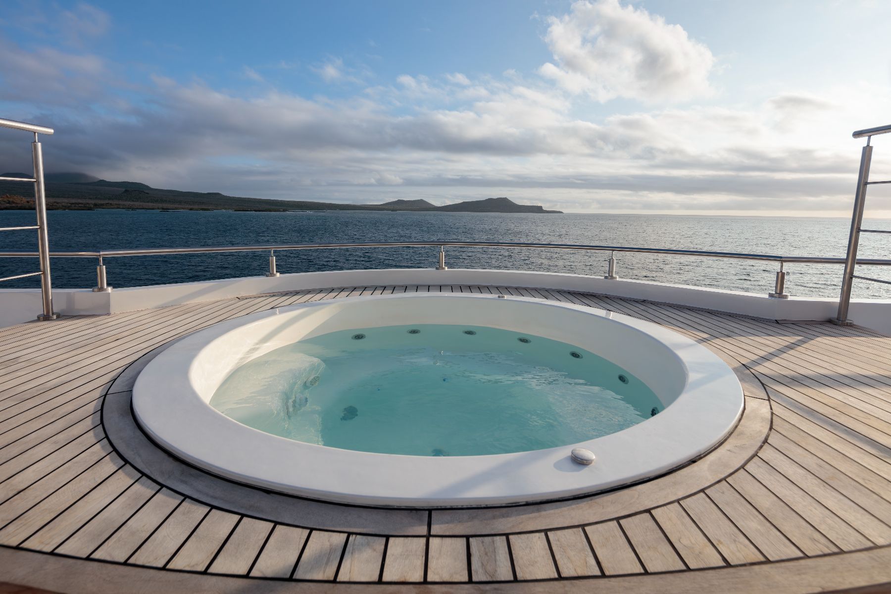 Outdoor Jacuzzi on the panoramic deck of Hermes Galapagos luxury catamaran