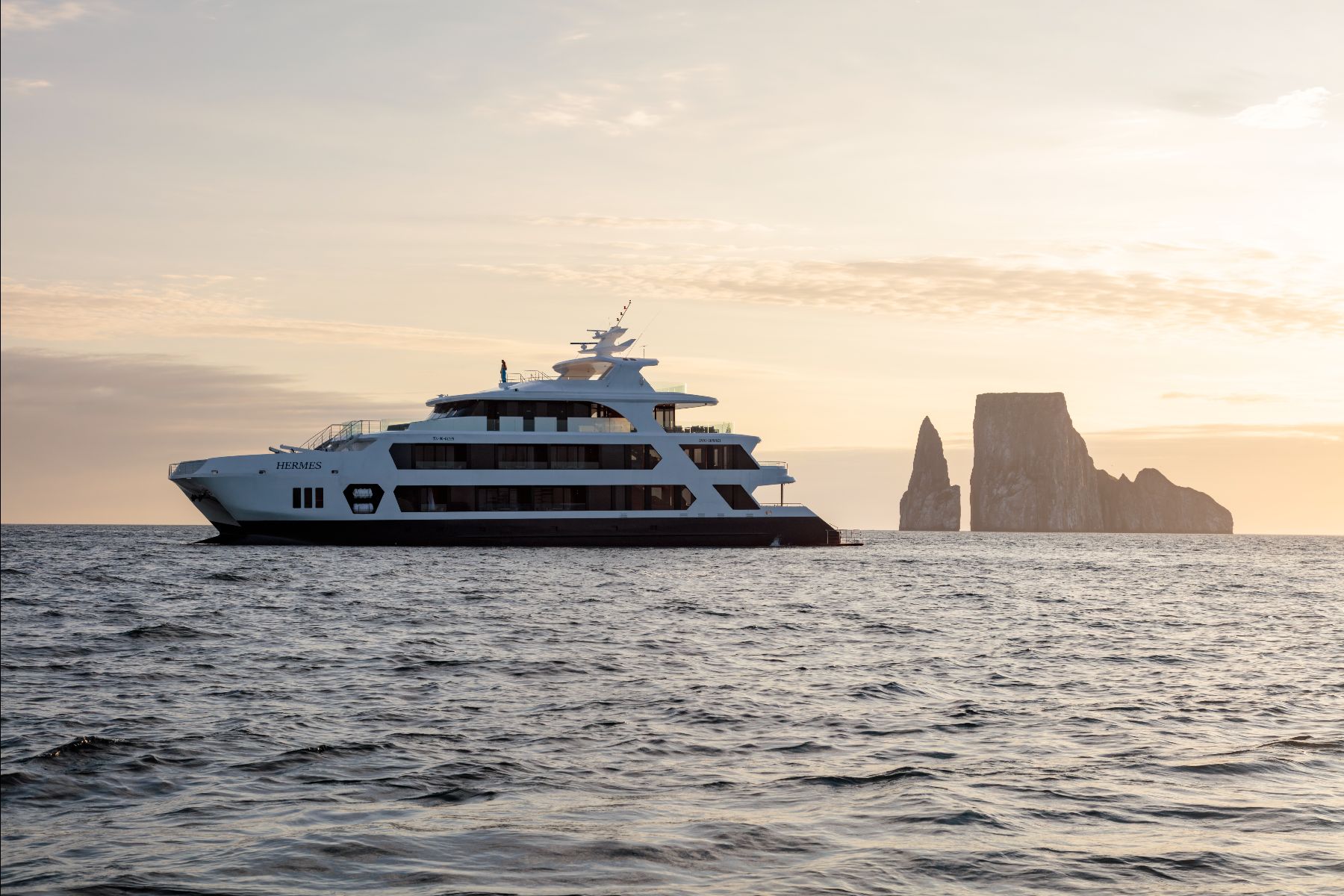 Hermes Galapagos luxury catamaran anchored near Kicker Rock