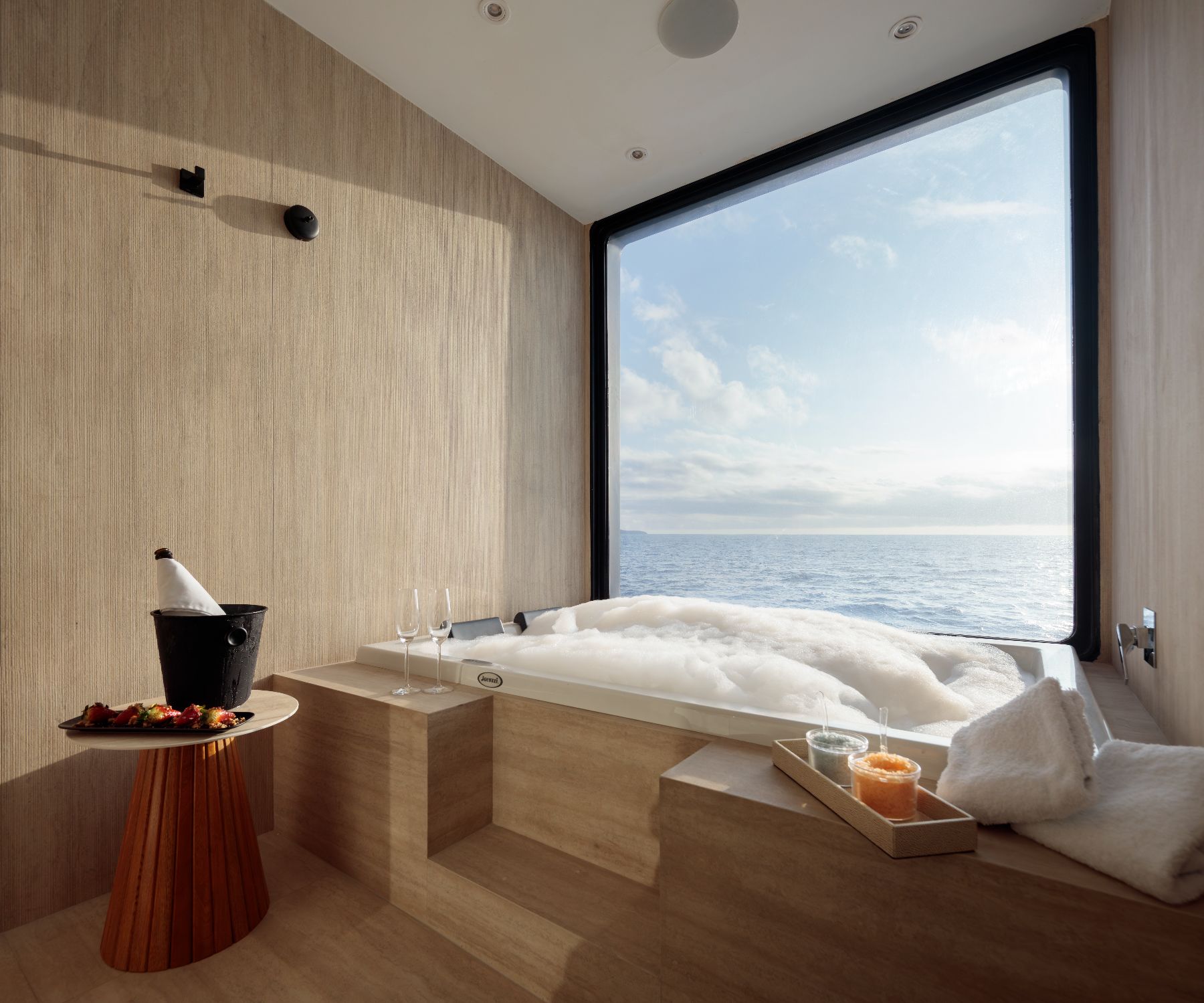 Private jacuzzi bath in a suite on board Hermes Galapagos luxury catamaran