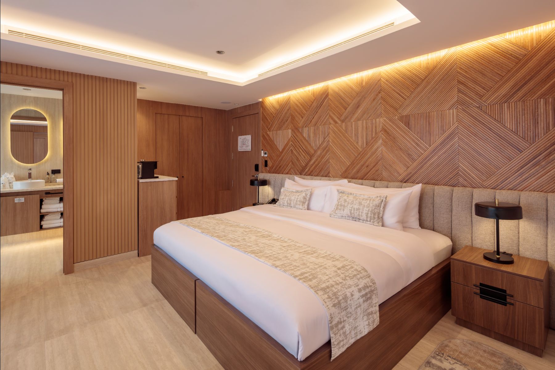 Suite on board Hermes Galapagos luxury catamaran with king size bed and large bathroom