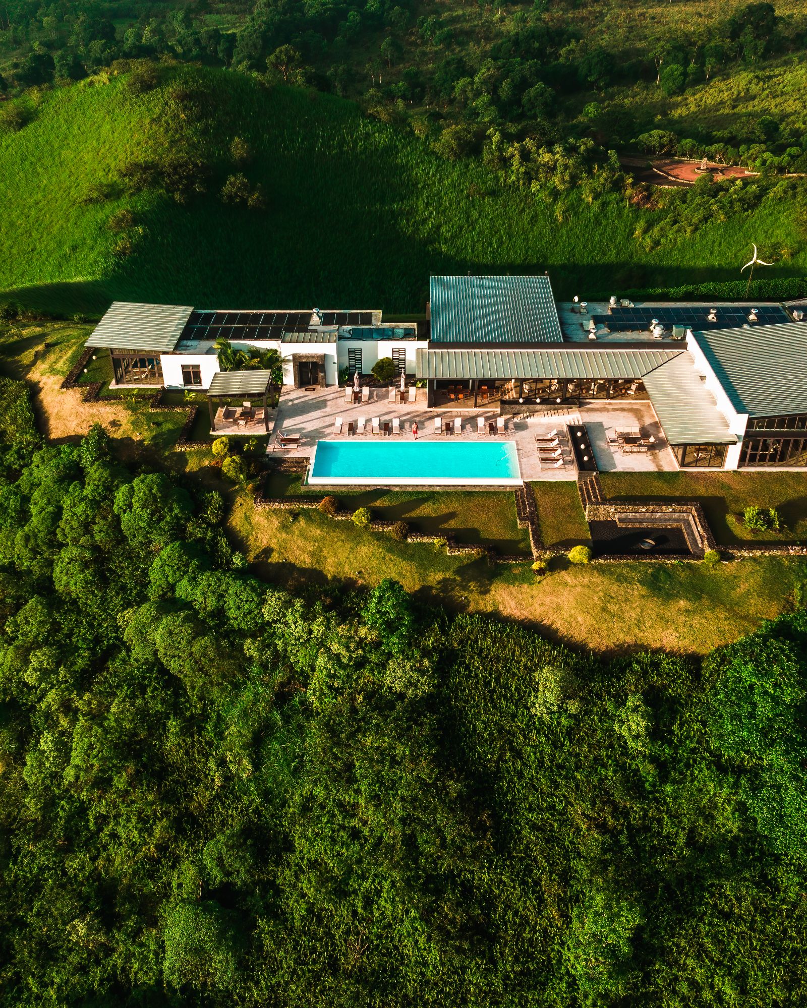 Bird's eye angle of Pikaia Lodge pool and guest suites on the Galapagos Islands of Ecuador