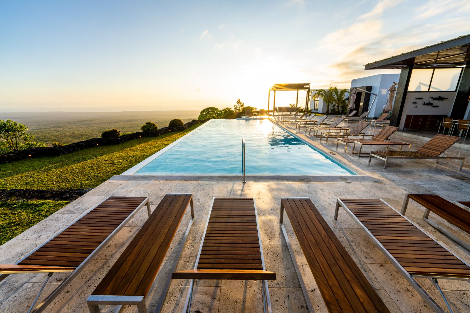 Poolside seen at sunset at Pikaia Lodge on the Galapagos Islands of Ecuador