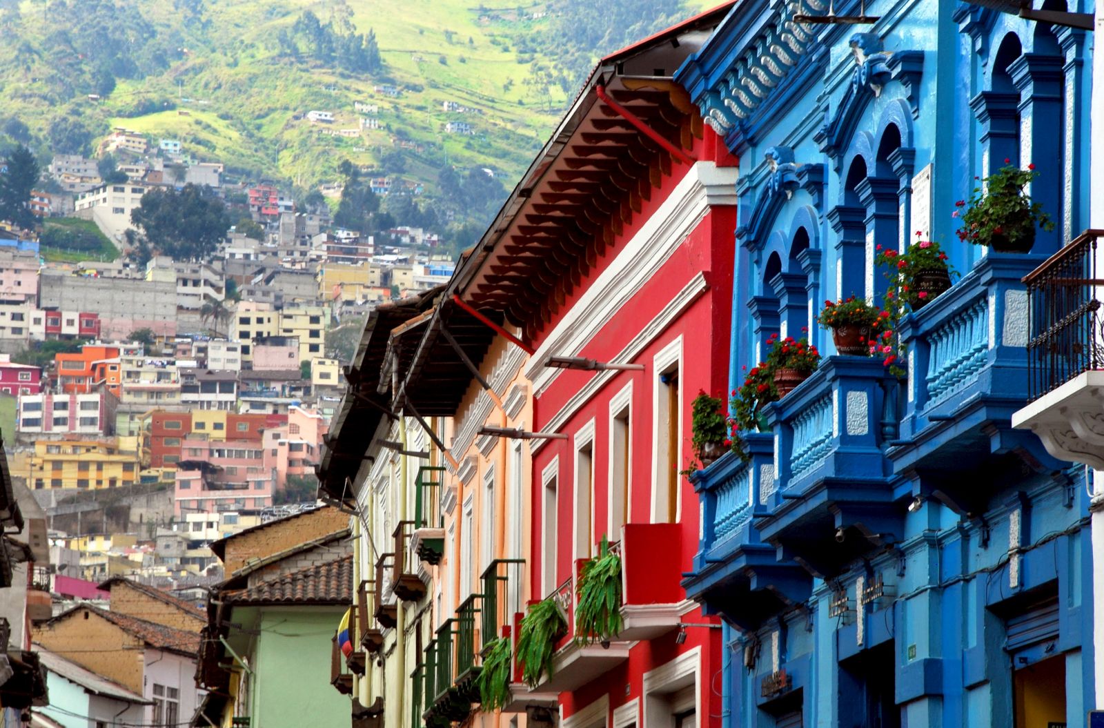 Colourful houses on a historic street in the colonial centre of Quito in Ecuador