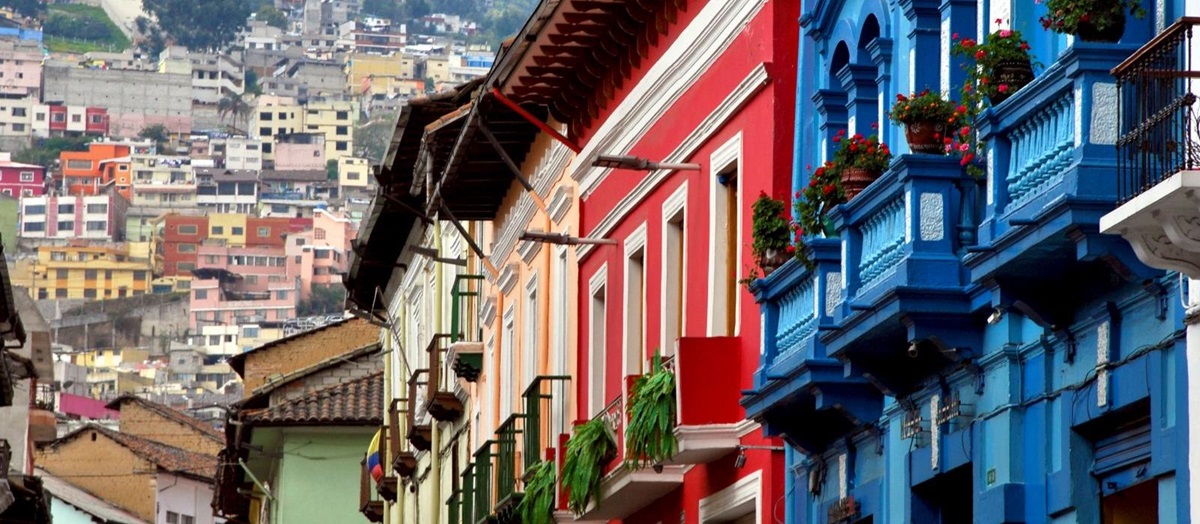 Colourful houses on a historic street in the colonial centre of Quito in Ecuador