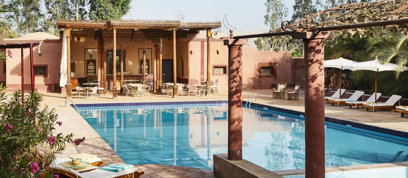 Swimming pool and sun terrace at the Al Moudira hotel in Luxor
