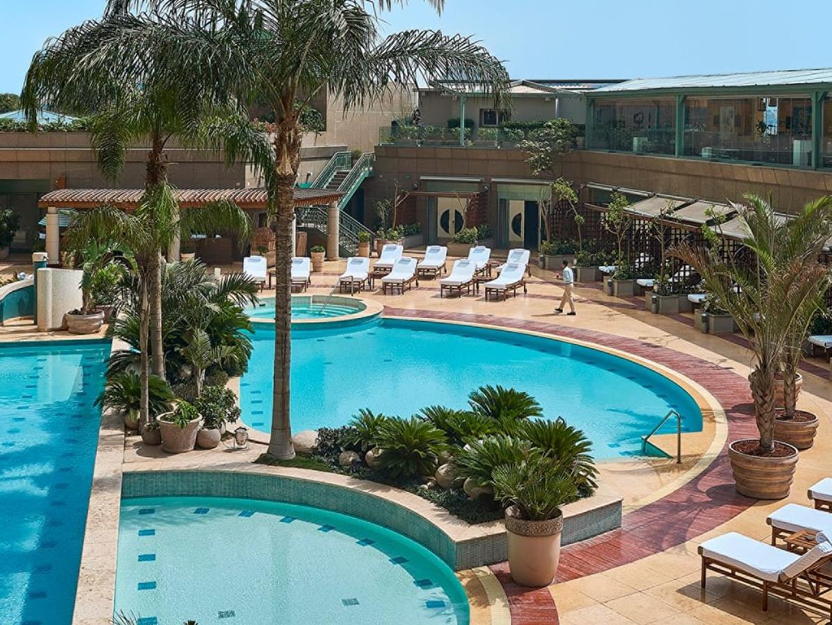 Swimming pool and terrace at Four Seasons Nile Plaza Cairo