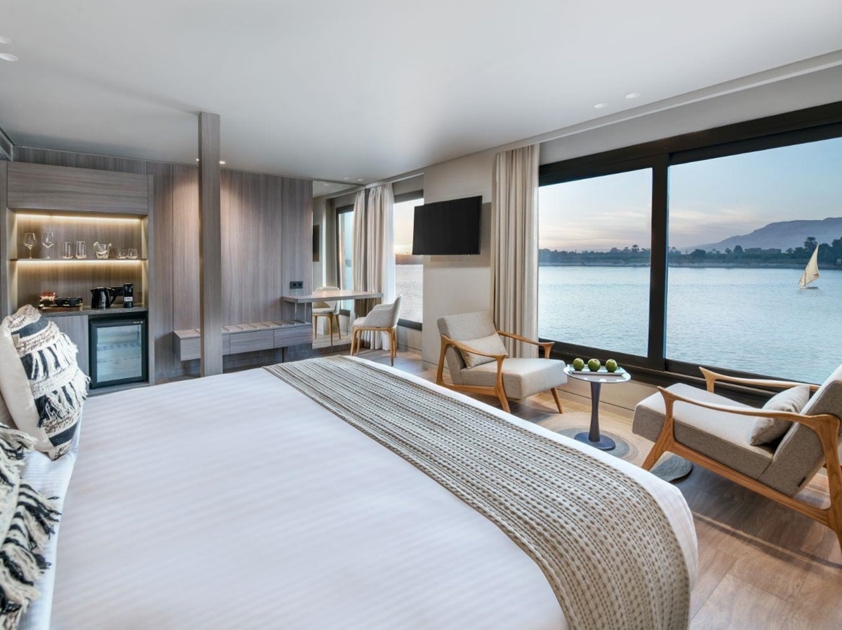 Guest bed and suite onboard the Historia boutique Nile cruise hotel in Egypt