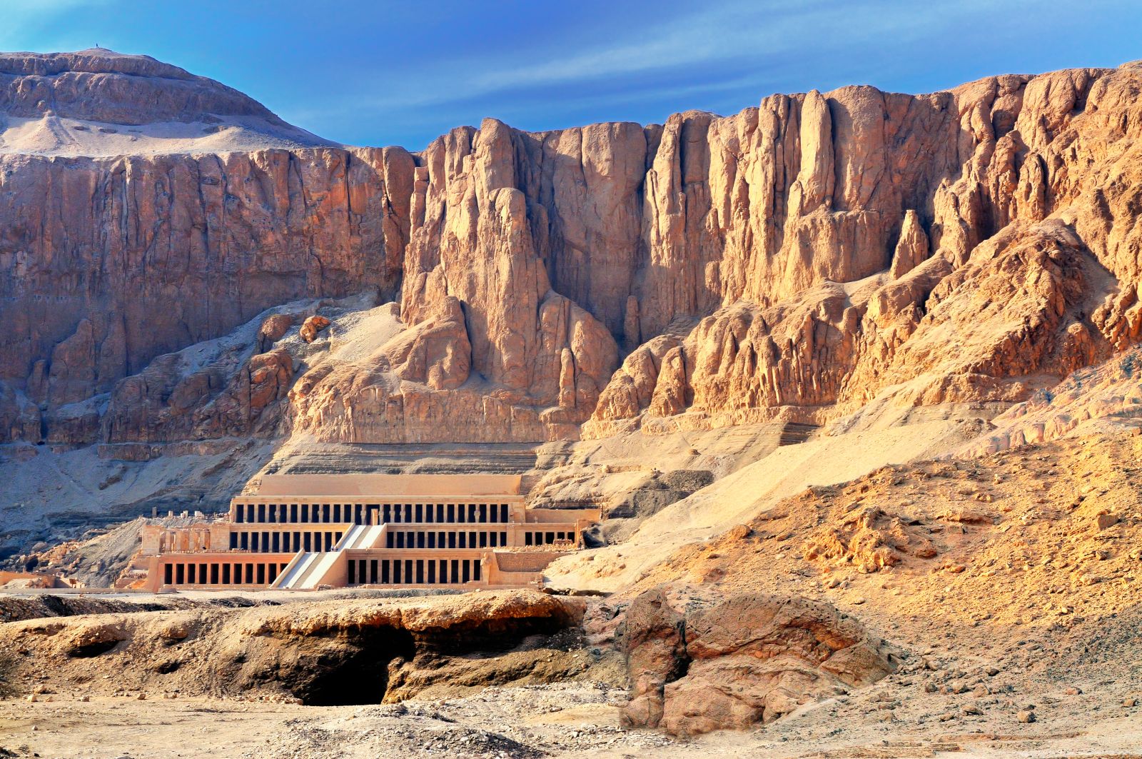View of the Hatsheput Temple against the backdrop of Egypt's Valley of the Kings