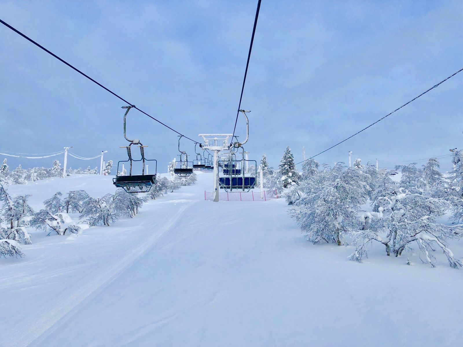 Chair lifts over the Finnish landscape