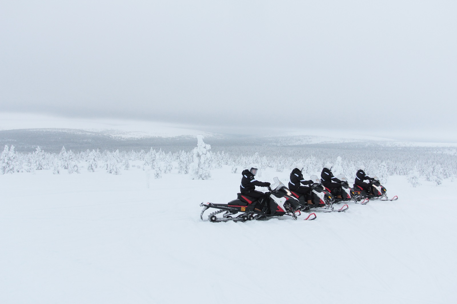 Snow mobiling from Javri Lodge in Finland