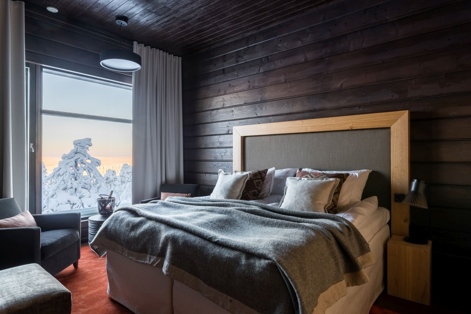 Guest room and view at Octola  wilderness lodge in Finnish Lapland