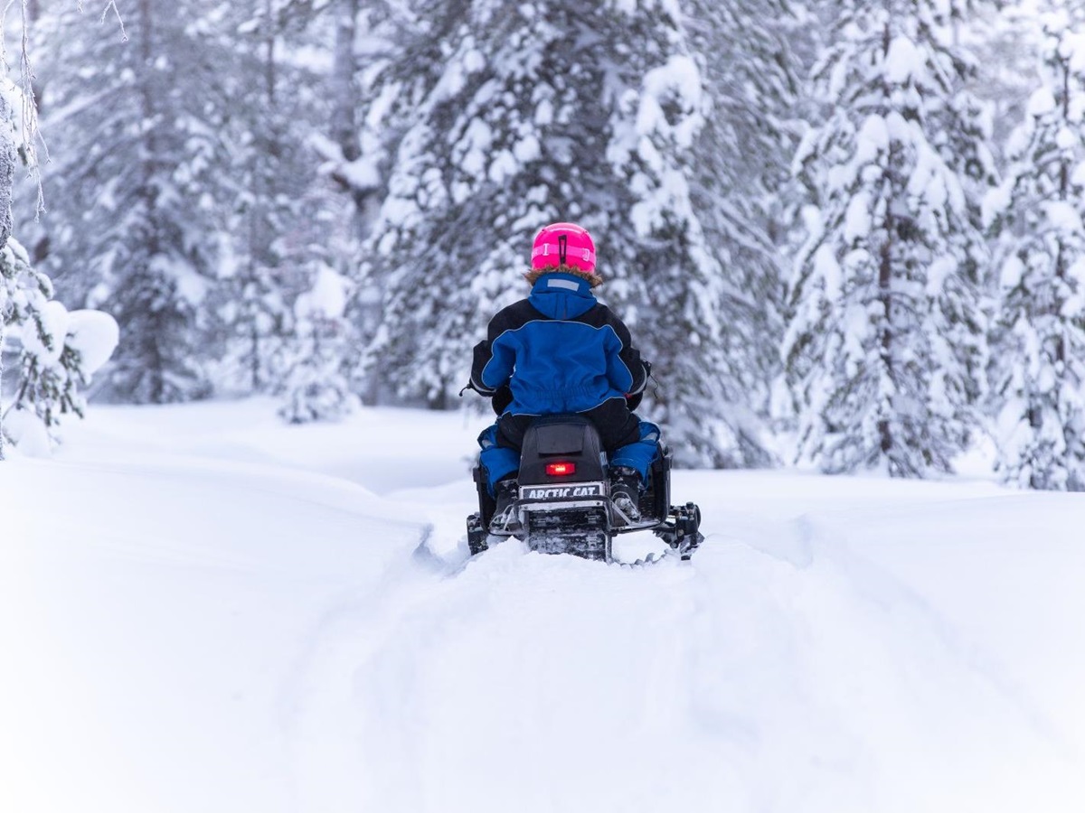 Mini snowmobile tour from Octola wilderness lodge in Finnish Lapland