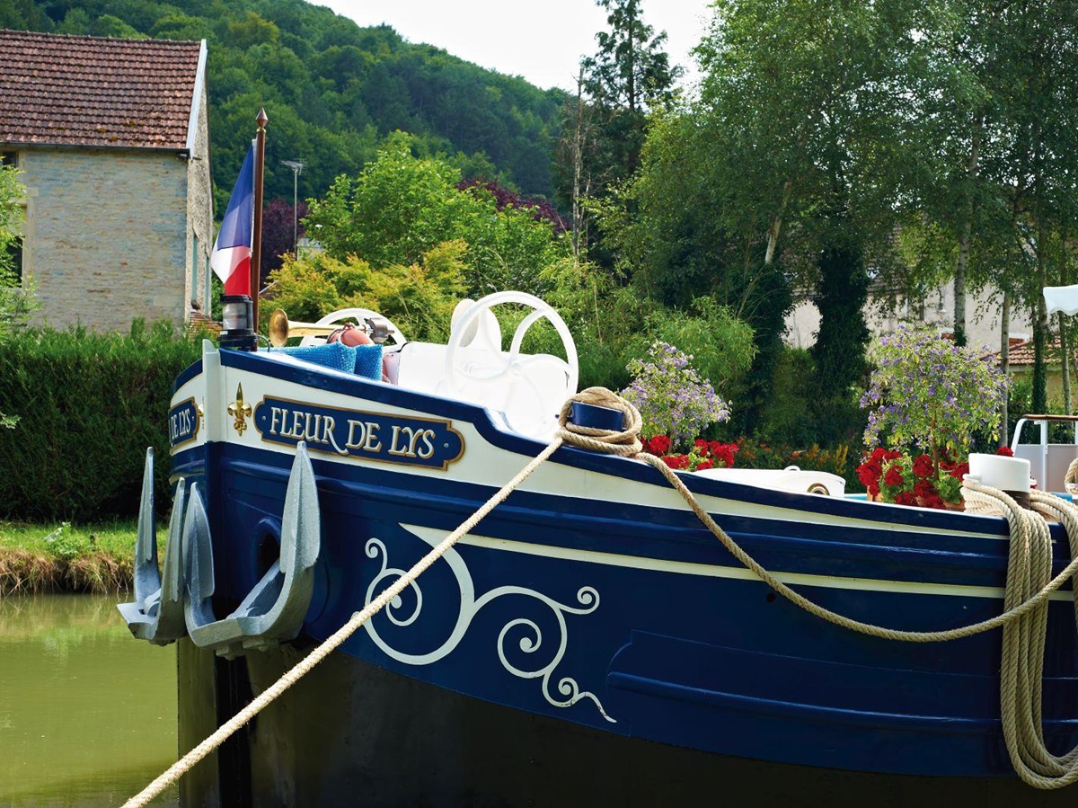 The bow of the Belmond Fleur de Lys river barge in France