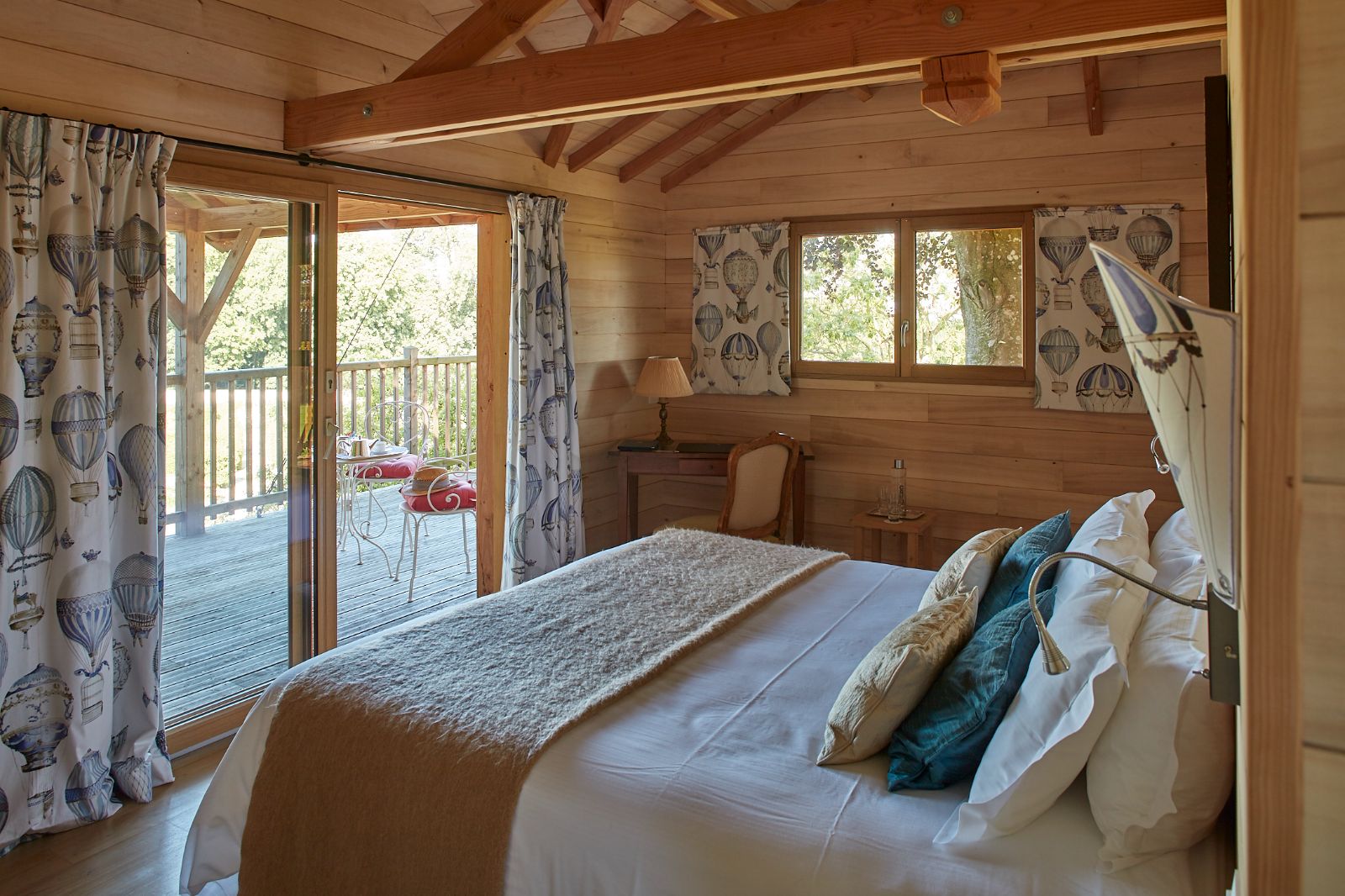 Bedroom and grounds view at Chateau d'Audrieu in the Normandy region of France