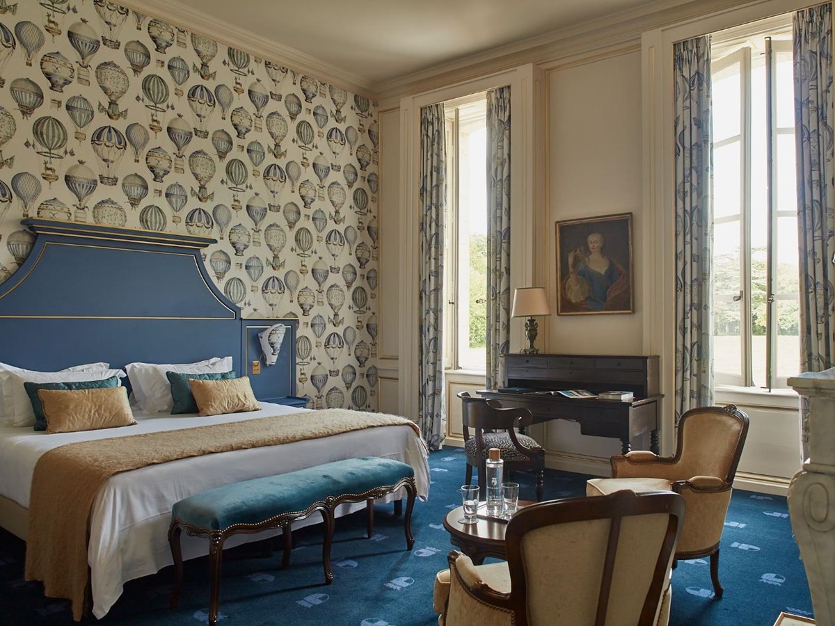 Blue guest suite at Chateau d'Audrieu in the Normandy region of France
