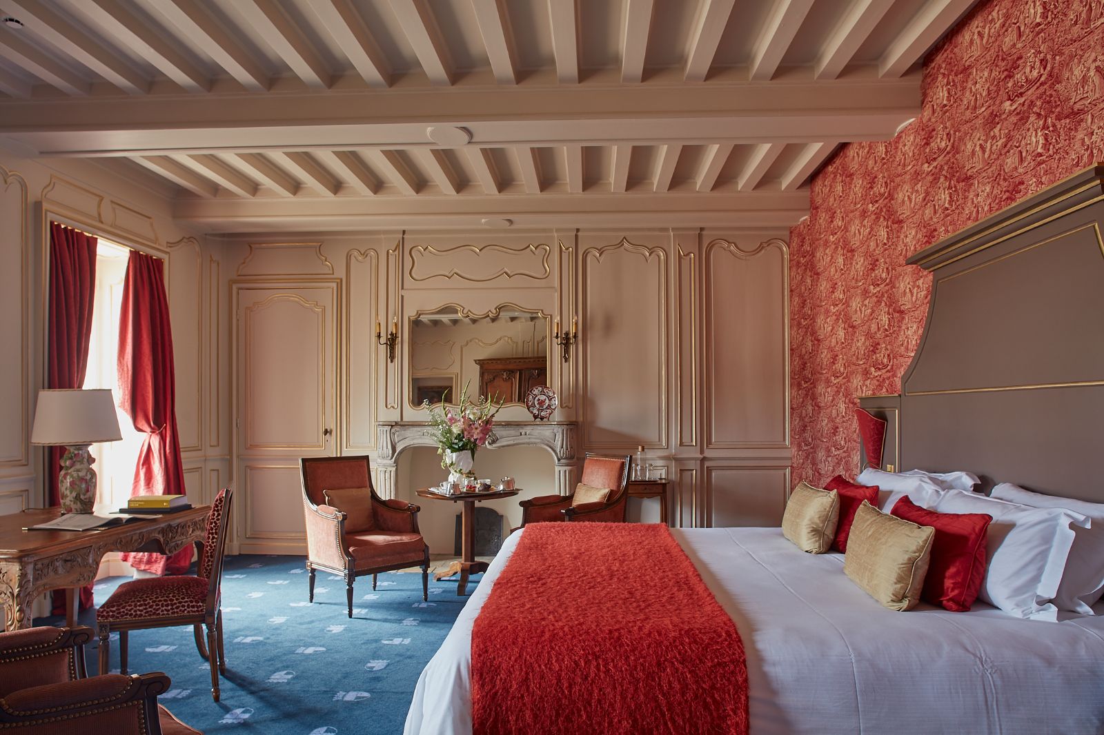 Orange guest suit at Chateau d'Audrieu in the Normandy region of France