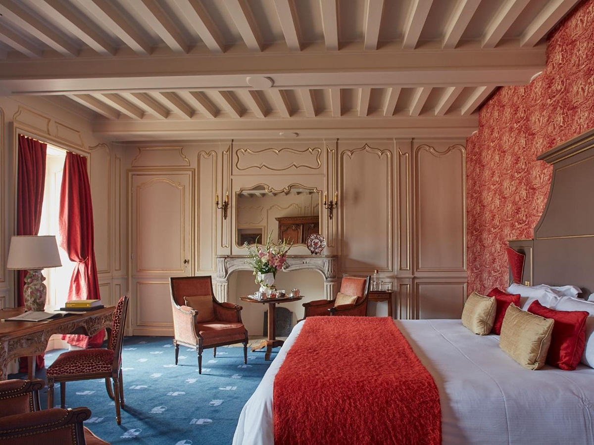 Orange guest suit at Chateau d'Audrieu in the Normandy region of France