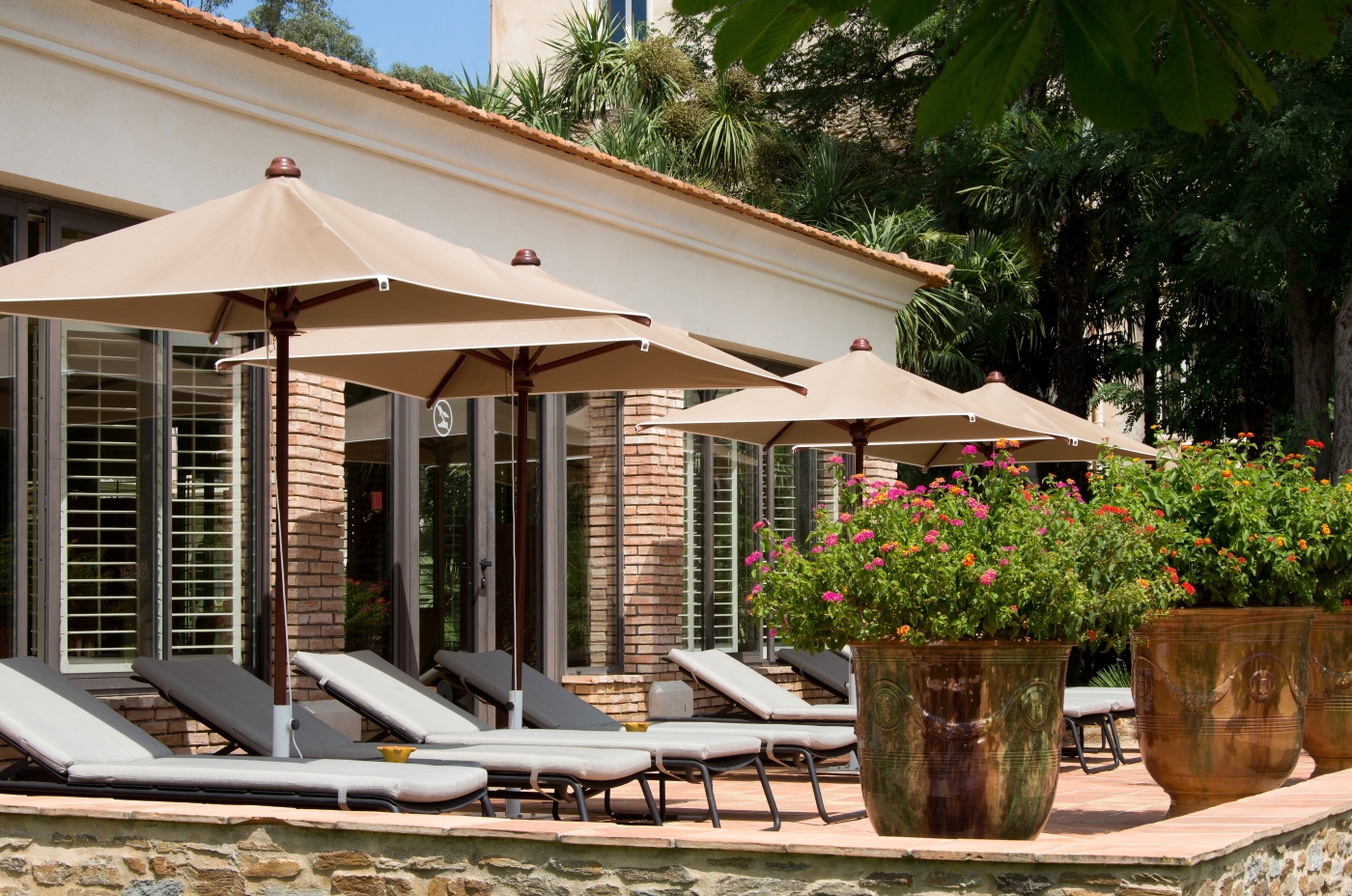 Spa and loungers at Chateau de Valmer in France