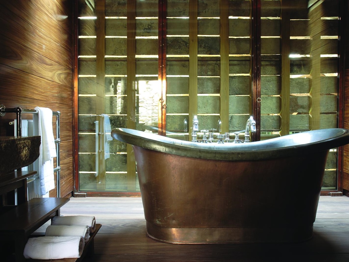 Large rolltop copper bath at domaine des etangs in france