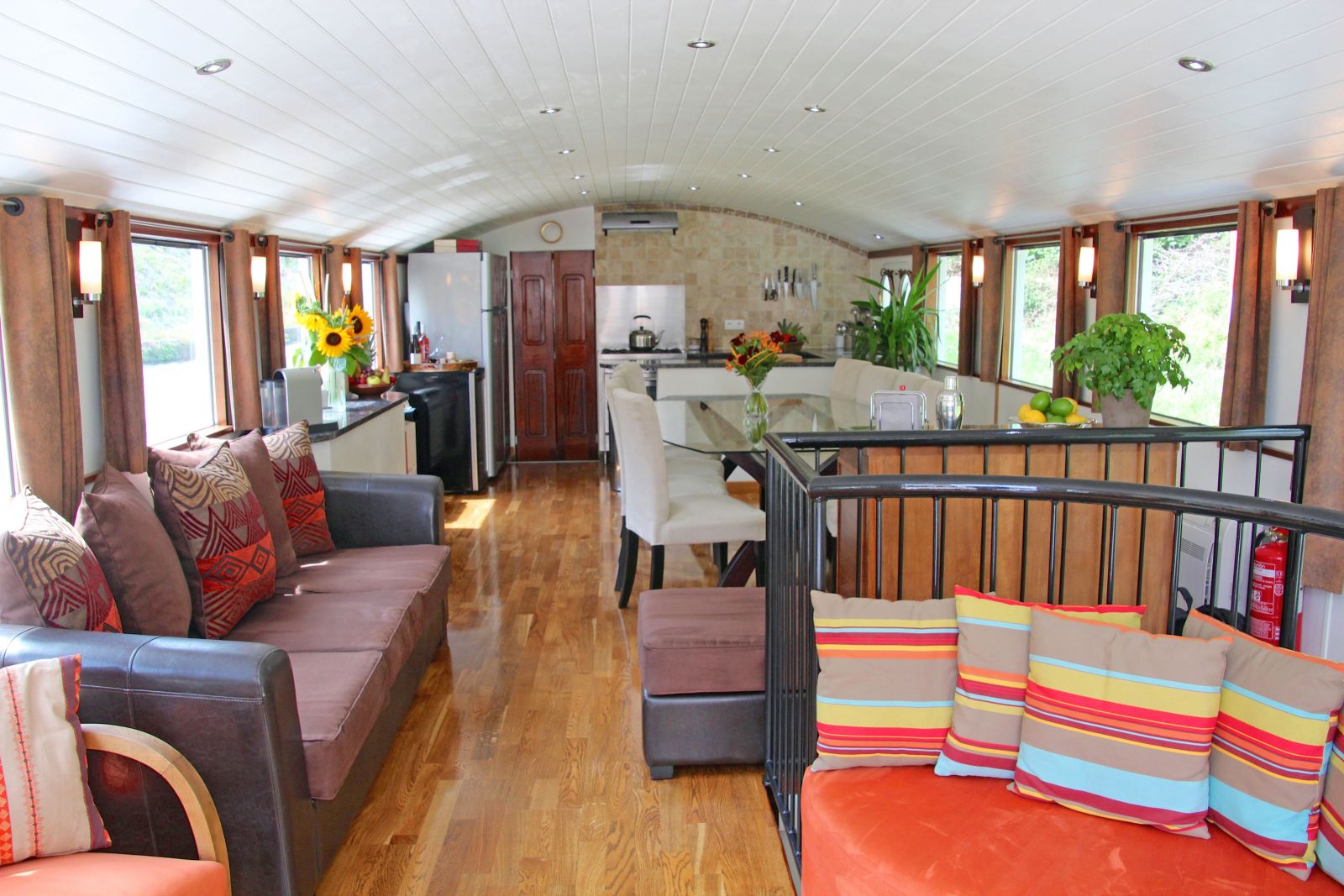 Spacious lounge on board the Enchante river cruise in France