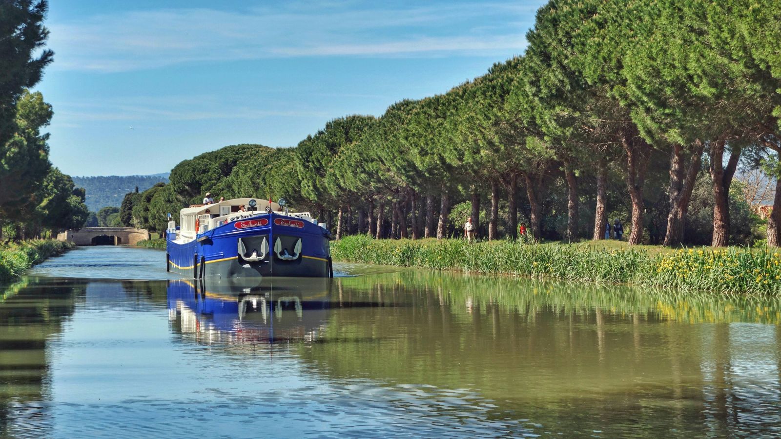The Enchante barge sailing through the French countryside