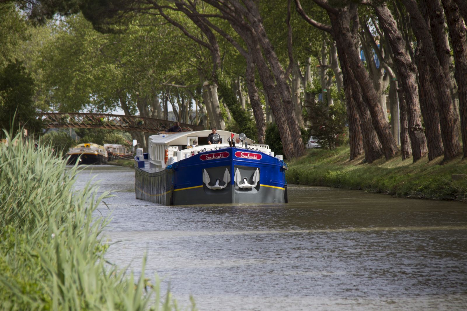 The Enchante barge sailing through the French countryside