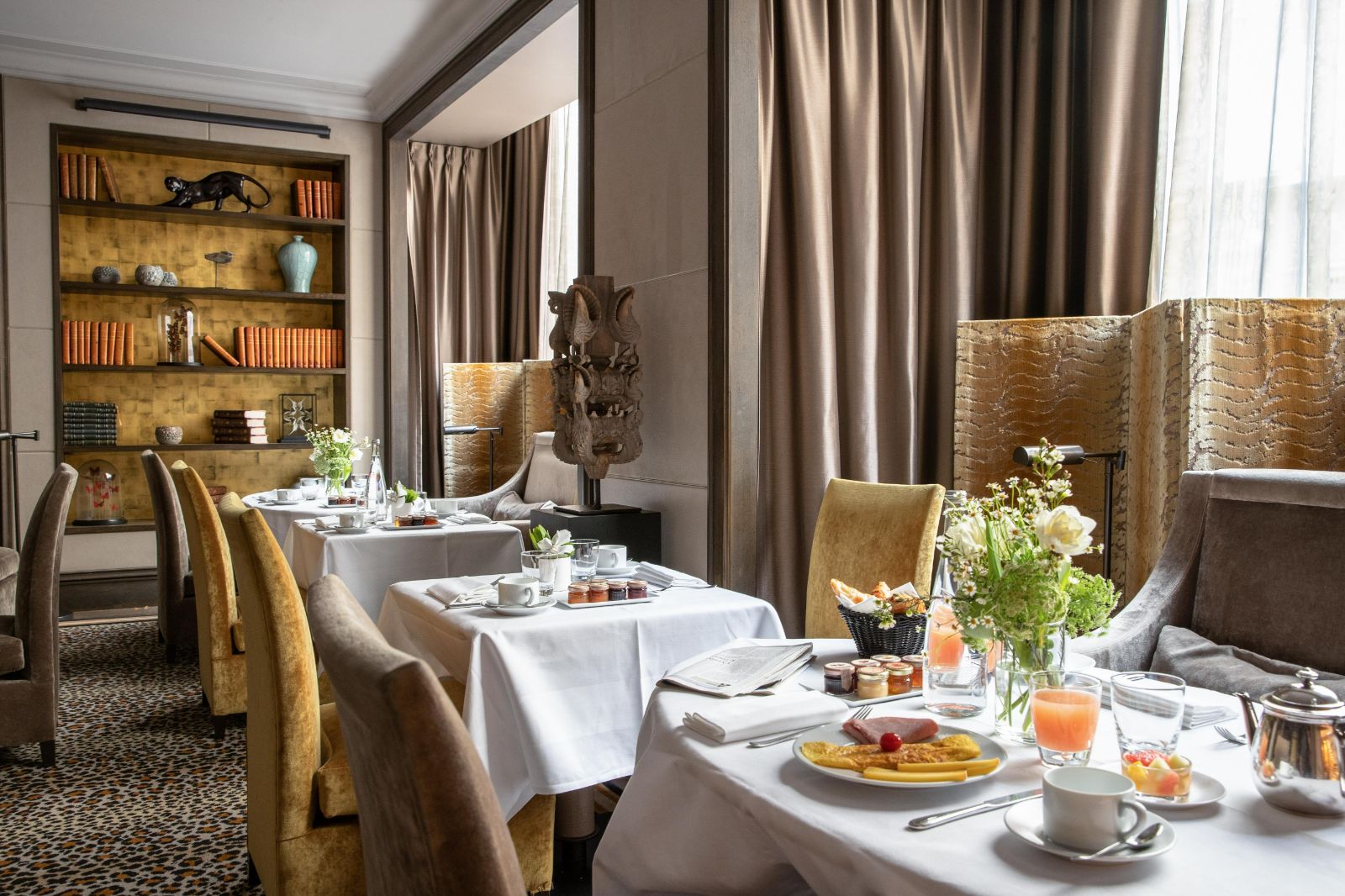 Restaurant tables at Esprit Saint Germain in Paris, France