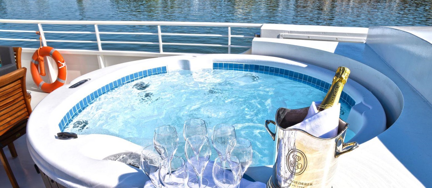 Champagne in the hot tub on board the Finesse river barge in France