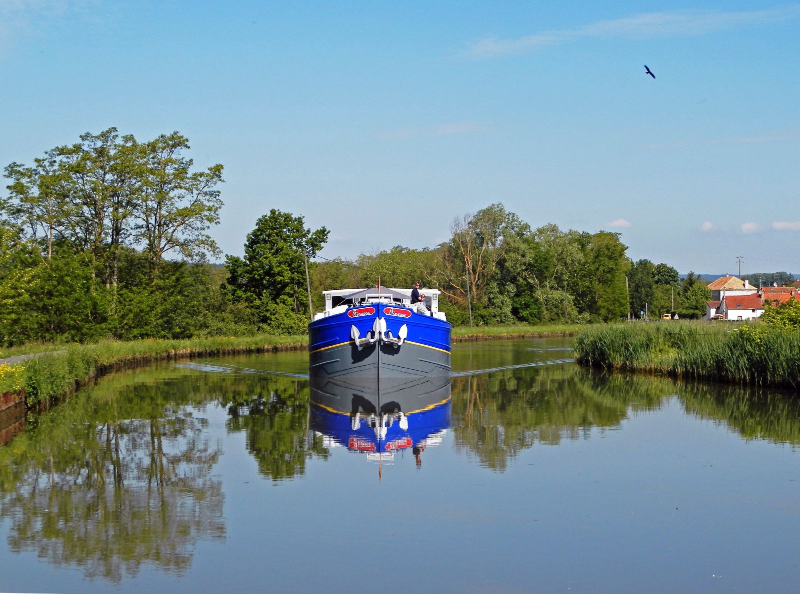 The Finesse river barge sailing through the French countryside