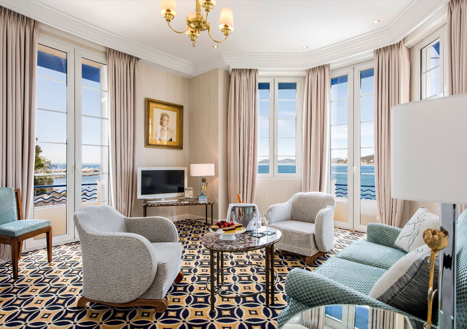 Blue guest suite lounge at Hotel Belles RIves on the Cote d'Azur in France