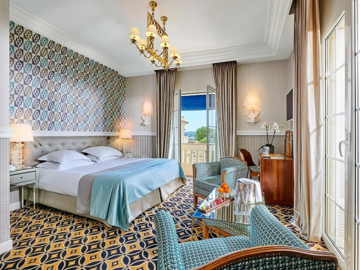 Blue double guest room at Hotel Belles RIves on the Cote d'Azur in France