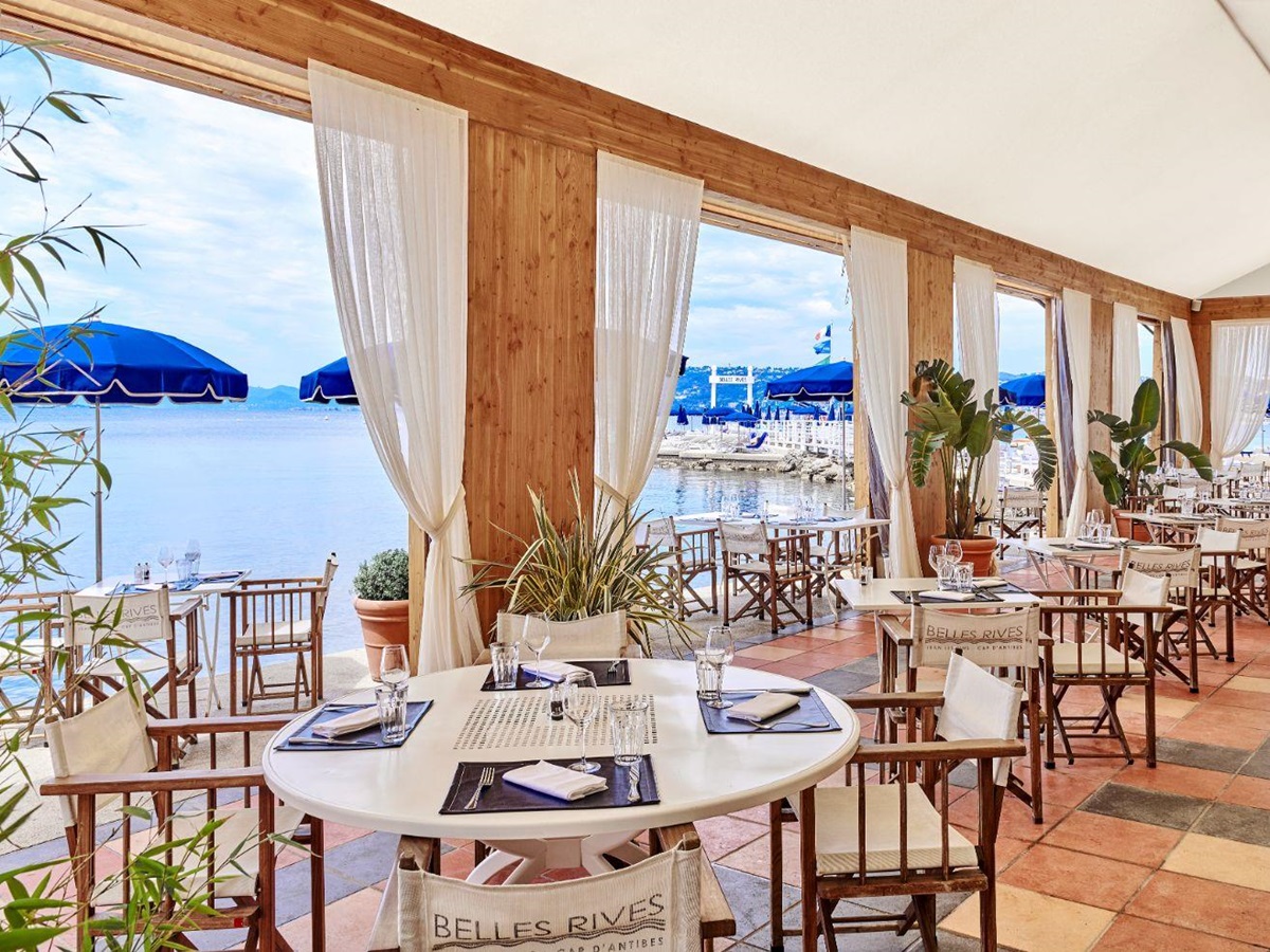 Outside restaurant seating at Hotel Belles RIves on the Cote d'Azur in France