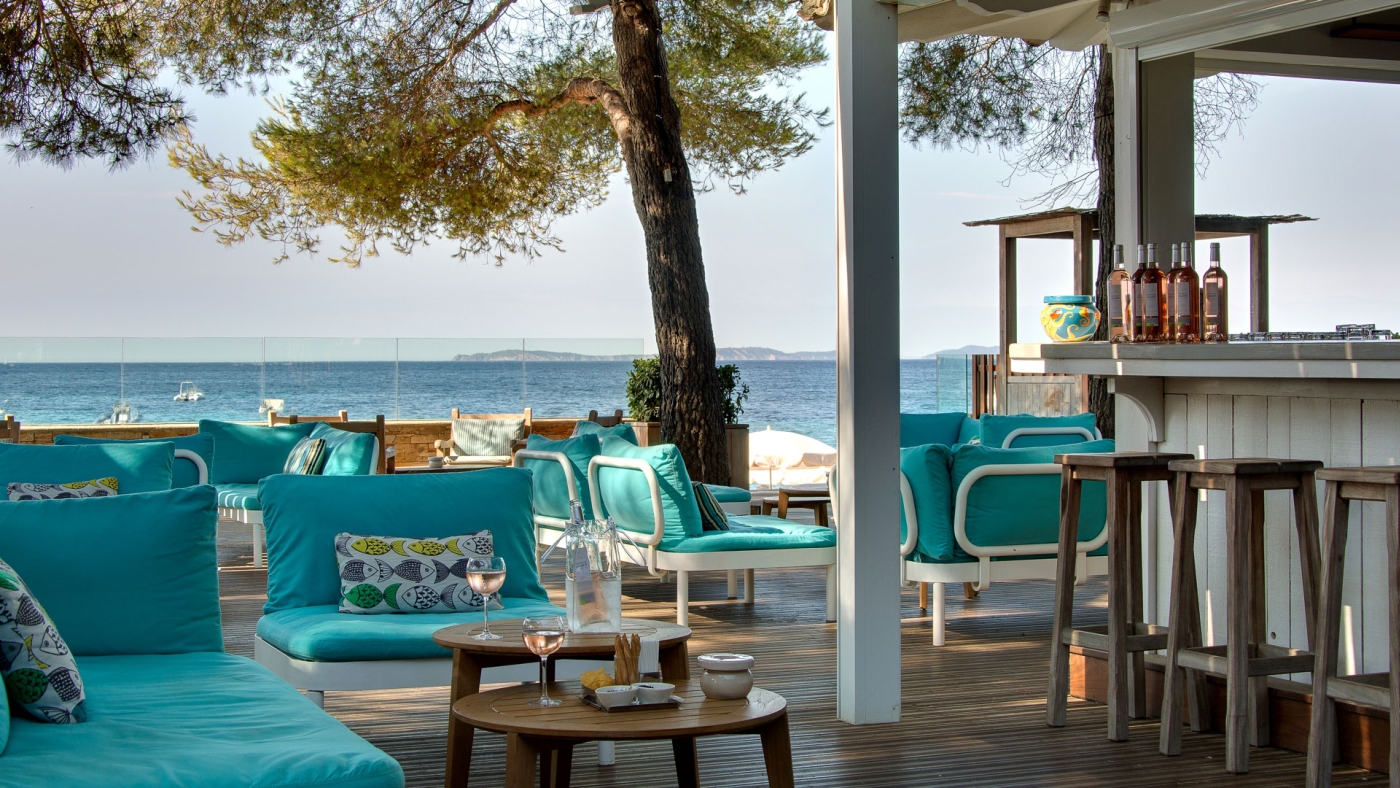 Relaxed bar area at Hotel La Pinede Plage in France
