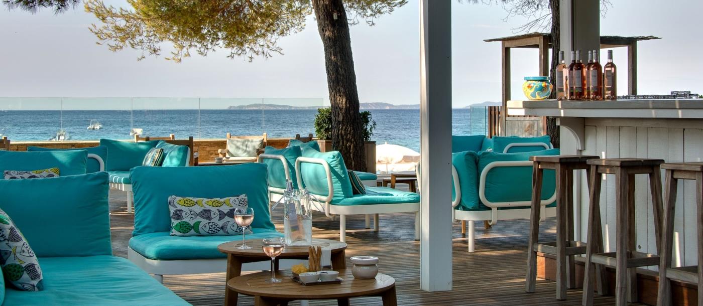 Relaxed bar area at Hotel La Pinede Plage in France