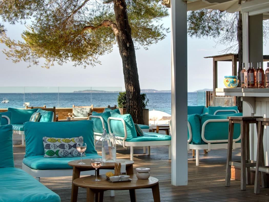 Relaxed bar area at Hotel La Pinede Plage in France