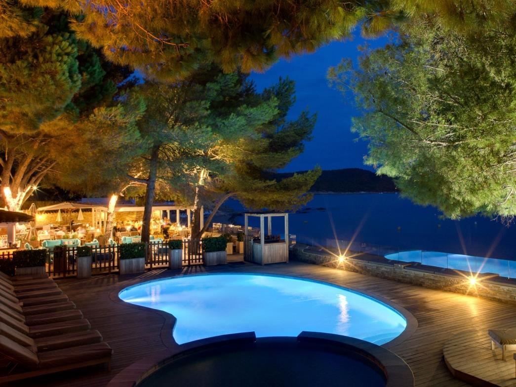 Pool at night at Hotel La Pinede Plage in France