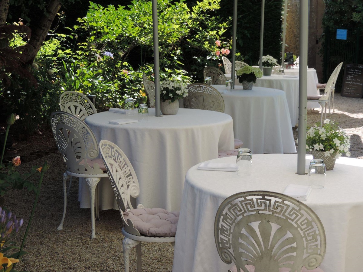 Dining room tables at Chateau La Cheneviere in the Normandy region of France