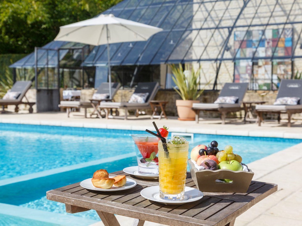 Food at the poolside at Chateau La Cheneviere in the Normandy region of France
