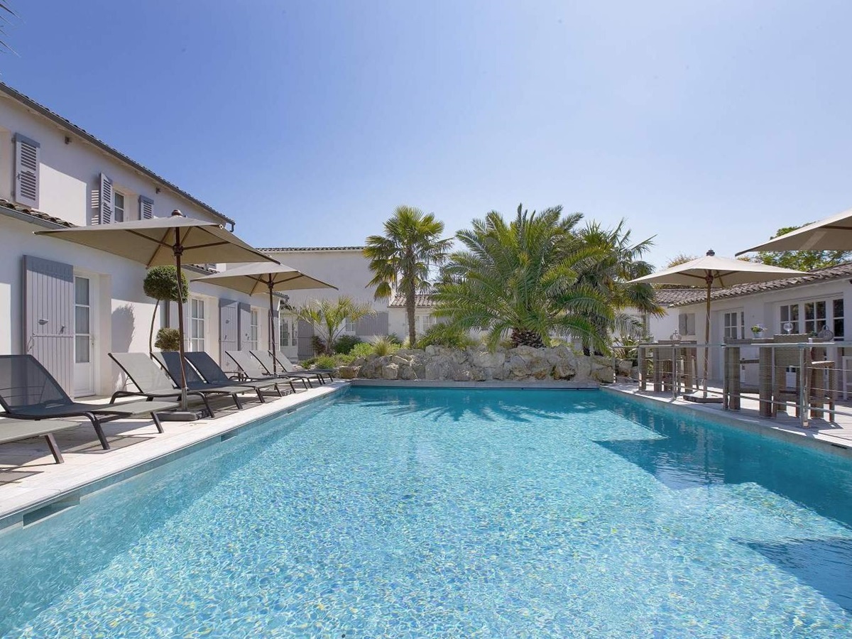 Pool at Le Clos Saint-Martin and Spa in France